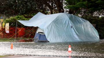 Campsite inundated with water at Stockton Caravan Park, Newcastle. Picture Peter Lorimer