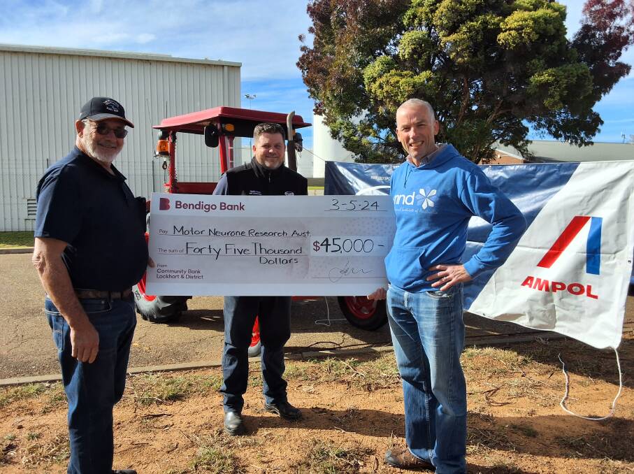 Neil Cole (Treasurer Two Rivers Run Committee), Matthew Tansy from Tasco Petroleum (sponsor) and Gethin Thomas, Director of Research MND Australia pictured with the donation. Pictyure supplied
